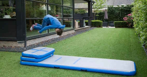 How do you use an inflated air track mat?